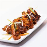 GRILLED WINGS · Natural organic chicken / spicy shata or BBQ