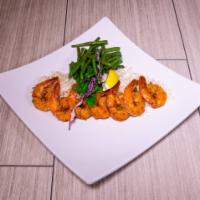 Grilled Shrimp · Jumbo grilled shrimp served with sauteed French green beans and rice.