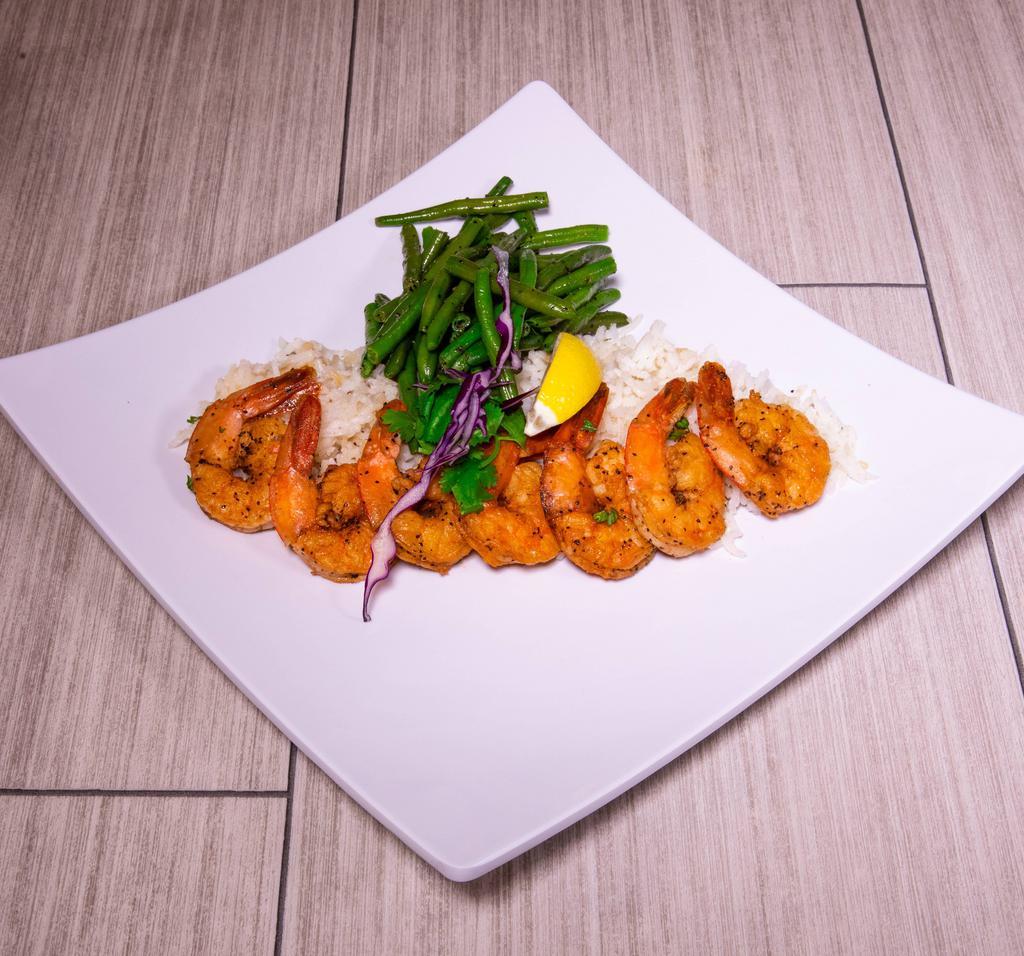 Grilled Shrimp · Jumbo grilled shrimp served with sauteed French green beans and rice.