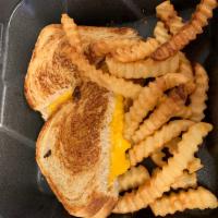Grilled Cheese Sandwich · Grilled sourdough stuffed with melted aged cheddar cheese.