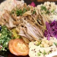 Chicken Shawarma Plate · slices of seasoned Chicken  served with rice, hummus, baba ghanoush, tabbouleh salad, tahini...