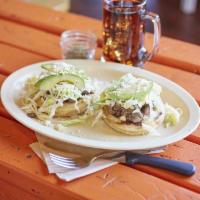 Dos Sopes · Traditional Mexican dish with two thick corn cakes deep fried with choice of beans, choice o...