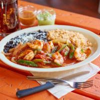 Sancho Diabla Shrimp · Sancho A La Diabla Shrimp cooked in a spicy tomato based sauce with onions and bell peppers ...