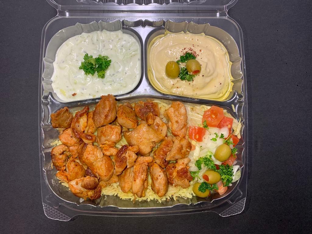 Chicken Plate With Pita Bread صحـن دجــاج · Chicken, rice, pita, onion, tomato, Tzatziki, lettuce and choice of sauce.( Hot Sauce,  Garlic Sauce )