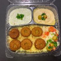 Falafel Plate With Pita Bread ( Vegan ) صحـن فـلافـل · Falafel, rice, pita, onion, tomato, lettuce and choice of sauce.