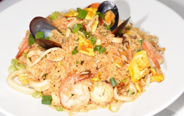 Seafood Fried Rice / Arroz Chaufa de Mariscos · Arroz chaufa de mariscos our amazing fried rice with calamari, shrimp, and octopus.