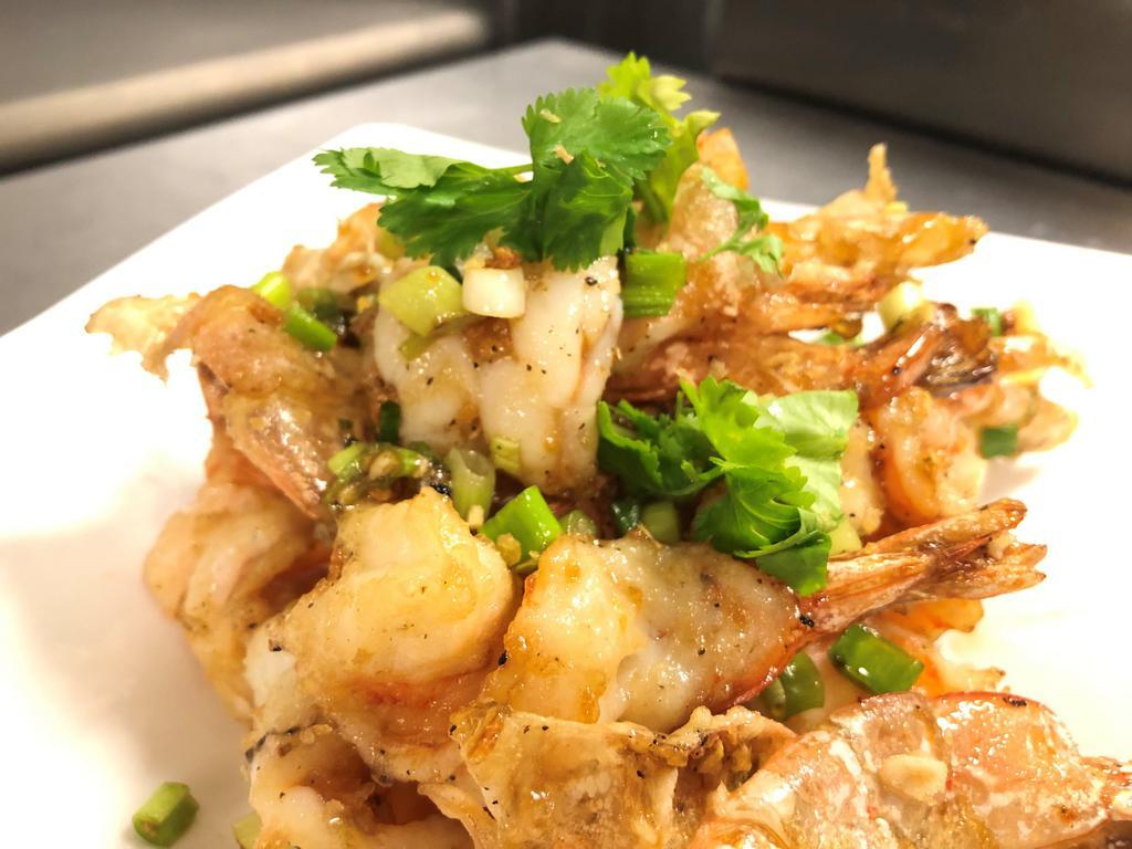 S82. Crispy Garlic Shrimp Special · Golden brown fried shrimp with crispy shells tossed with salt, and pepper, seasoned with fried garlic.