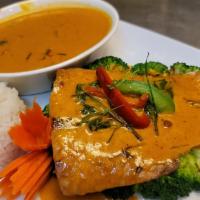 Yellow Curry Salmon · Grilled Salmon topped with yellow curry