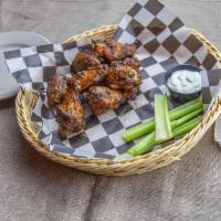 Jumbo Wings · 8 jumbo wings, choice of sauce and served with bleu cheese or ranch