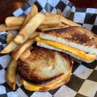 Kid's Grilled Cheese. Served with steak fries. · Melted American Cheese