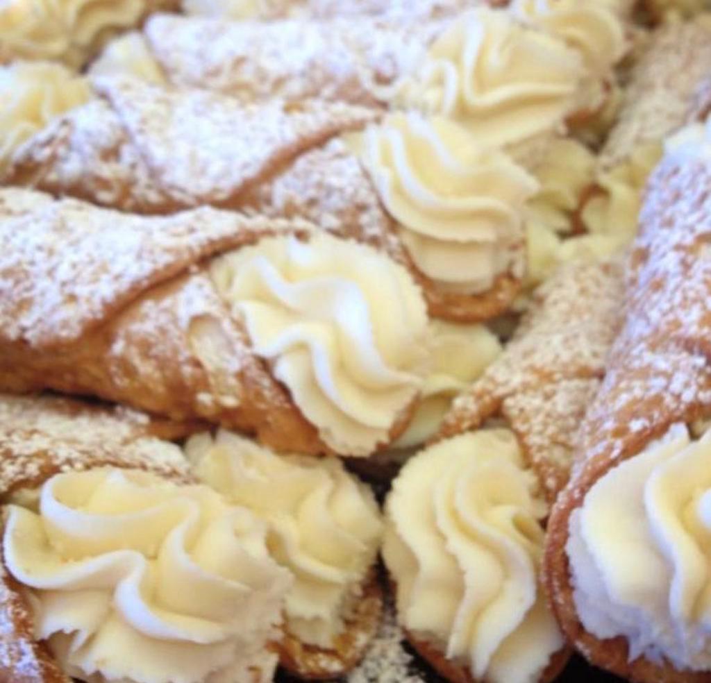 Ricotta Cannoli with Real Madagascar Vanilla Bean · Fresh filled with traditional Ricotta filling. Vanilla bean and castor sugar.