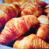 Homemade Butter Croissant · Served with nutella or strawberry or orange jam.