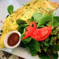 Omelette au Saumon Fume · 2 eggs, smoked salmon, asparagus, red onions and goat cheese.