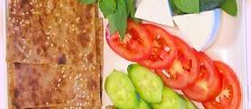 Bread & Cheese · feta cheese , tomato, cucumber, walnuts , herbs and bread 