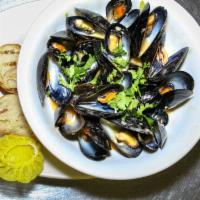 Mussels Andaluza · Mussels sautéed in olive oil, white wine, garlic, onions and ginger