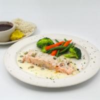 Salmon Mediterranean · Fresh filet of Salmon topped with a light cream sauce made with garlic, Spanish capers, and ...
