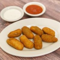 Jalapeno Poppers · Filled with cheese and fried.