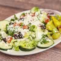 Greek Salad · Romaine lettuce, tomatoes, cucumbers, Kalamata olives, pepperoncini, red onions, feta cheese...