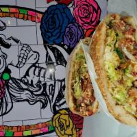 Chorizo Cemitas · Puebla style sandwich. Sesame roll, beans, lettuce, tomatoes, onions, cheese, avocado, papal...