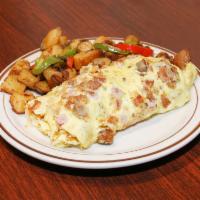 The Supreme Omelette · Linguica, sausage, bacon, ham, cheddar jack and Swiss cheese. 4 egg omelette with choice of ...