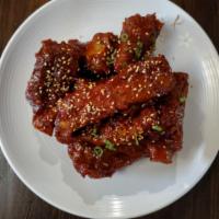 D8. Spicy Pork Ribs · Pork Ribs marinated in Korean spice + Rice