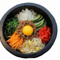 D11. Stone Pot Bibimbab · Rice topped w/ spinach, roots, sprouts, carrots, radish, mushroom, egg, and bits of Beef