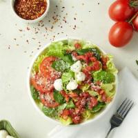 Caprese Side Salad · Freshly cut Roma tomatoes, fresh mozzarella cheese, tomato bruschetta, Romano cheese and Ita...