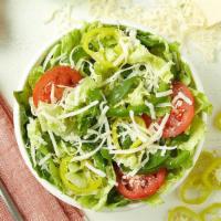 Italian Garden Party Salad · Freshly cut Roma tomatoes and green peppers, banana peppers and smoked provolone. Served wit...