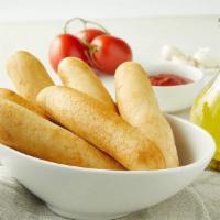 Italian Garlic Breadsticks · Served with marinara sauce for dipping.