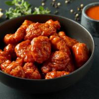 Boneless Wings · Breaded all white meat chicken hand-spun with choice of signature Donatos wing sauce.