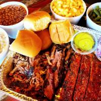 Family BBQ Meal · 3 Meats (2.5 lbs total), 4 sides, your choice of bread and sauces. Feeds 4-5 people. Must ch...