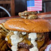 Fried Pickle Burger · We took our OG Burger to the next level by adding house-battered friend pickles and jalapeno...
