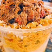 BBQ Sundae · Loaded Mashed Potatoes and cheesy Mexican-style corn with Prime Brisket and Jalapeno Cheddar...