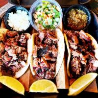 Taco Plate · Three street tacos stuffed with your choice of meat, onions and cilantro. Also includes your...