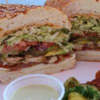 13. Chicken Club Sandwich · Avocado and bacon. Cajun mayo, Yellow mustard, lettuce, tomato, red onion, and pickles.