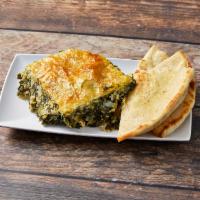 Spinach Pie · Spanokipita! Our house made recipe. Served with pita bread, rice pilaf and green beans.