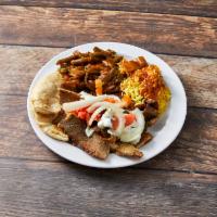 Gyro Platter · Rotisserie cooked lamb and beef seasoned to perfection, plated with fresh onions, tomatoes a...