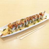Rain Forest Roll · Shrimp tempura and avocado inside, topped with spicy tuna, salmon and tempura flakes, scalli...