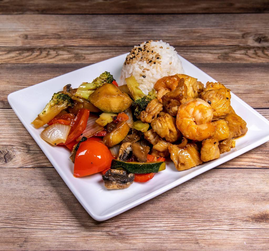 Chicken Hibachi Combo · Served with 2 piece hibachi shrimp, vegetables and steamed rice.