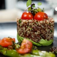 Quinoa Tabbouleh  · White and red quinoa, fine herbs, tomato, asparagus and avocado. 