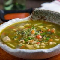 Chicken Soup · Cilantro and chicken soup, green peas, carrot and rice. 