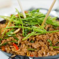 3 Flavor Chaufa · Wok-fried rice, sauté with shrimp, chicken and beef, chives, peppers and egg.