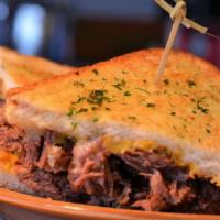 SHORT RIB GRILLED CHEESE · BRAISED SHORT RIB, AMERICAN, SWISS AND CHEDDAR CHEESE, SERVED ON A GARLIC SOUR DOUGH TOAST