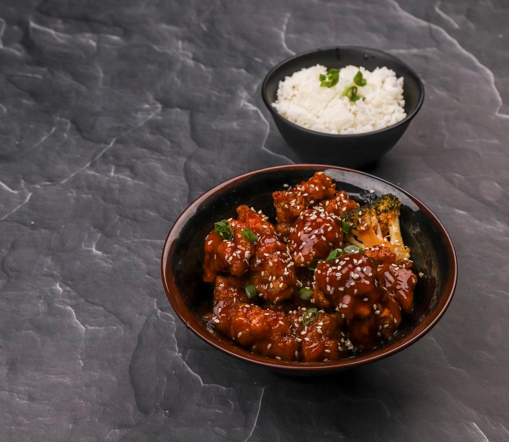 C02. General Tso's Chicken · Broccoli and bell pepper. Served with white rice. Spicy.