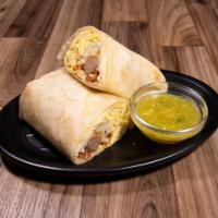 Hash Brown Burrito · Served with eggs, sausage, hash brown, bacon, cheese and sour cream.