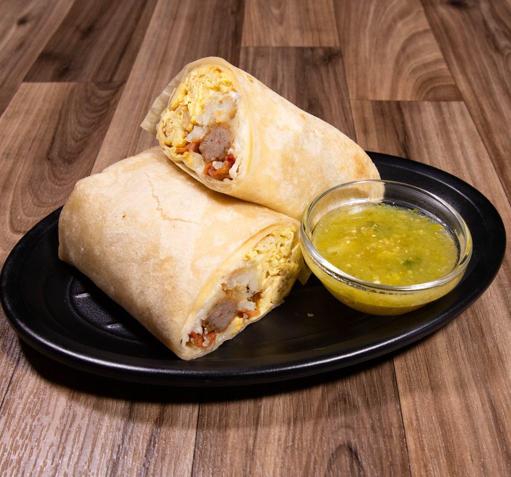 Hash Brown Breakfast Burrito · Served with eggs, sausage, hash brown, bacon, cheese, and sour cream.