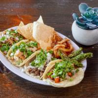 Street Tacos!! · Steak.grilled chicken, al pastor.
onions and cilantro!