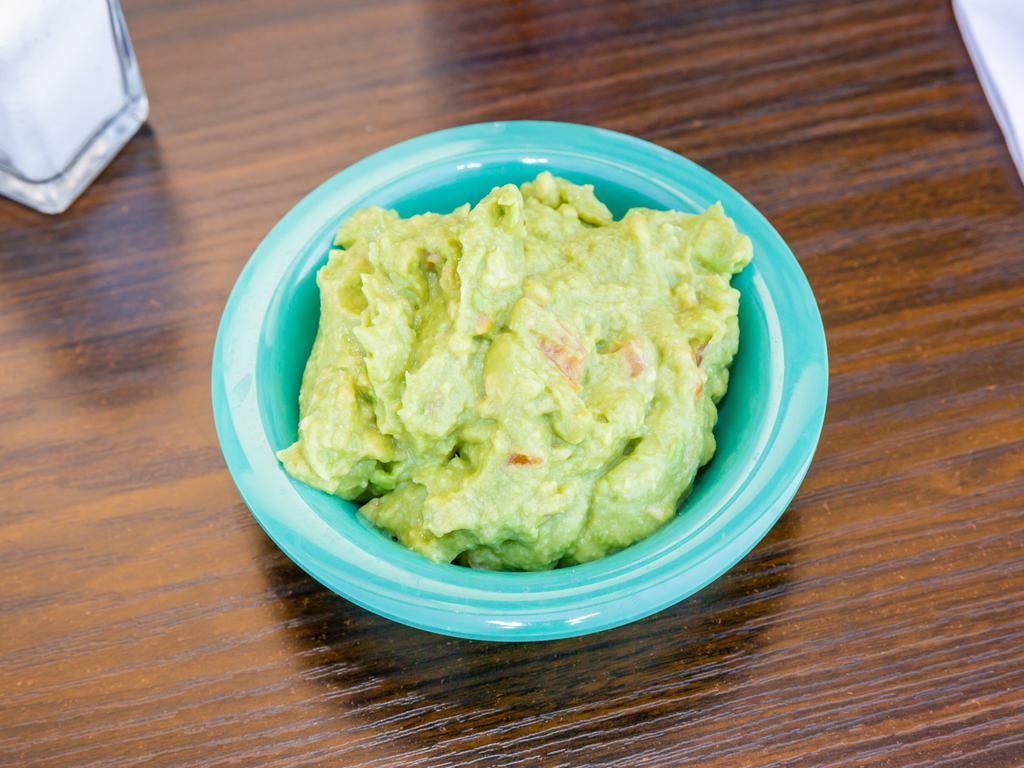 Guacamole Dip  · Fresh avocado blended with tomatoes, onions and spices. 