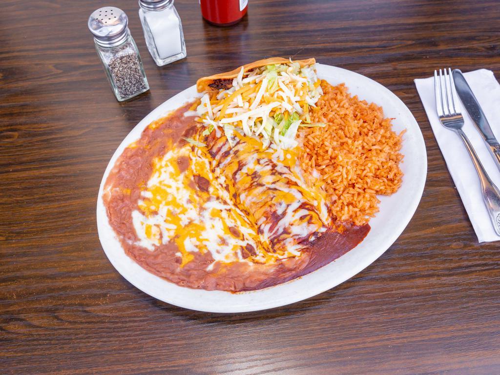 6. One Chicken Enchilada and Taco Combo · Served with rice and beans.