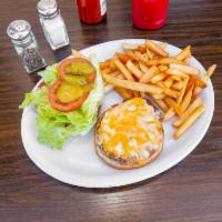 1/3 lb. Cheeseburger · Lean ground beef with cheese, lettuce, tomatoes and pickles served on a toasted bun. Served ...